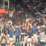 A packed WNBA arena during the 2024 Finals, illustrating queer visibility in the WNBA